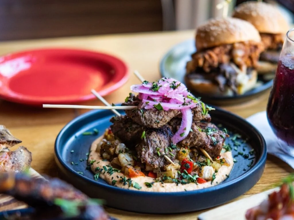 a table full of Finger Food at Cafe Tu Tu Tango