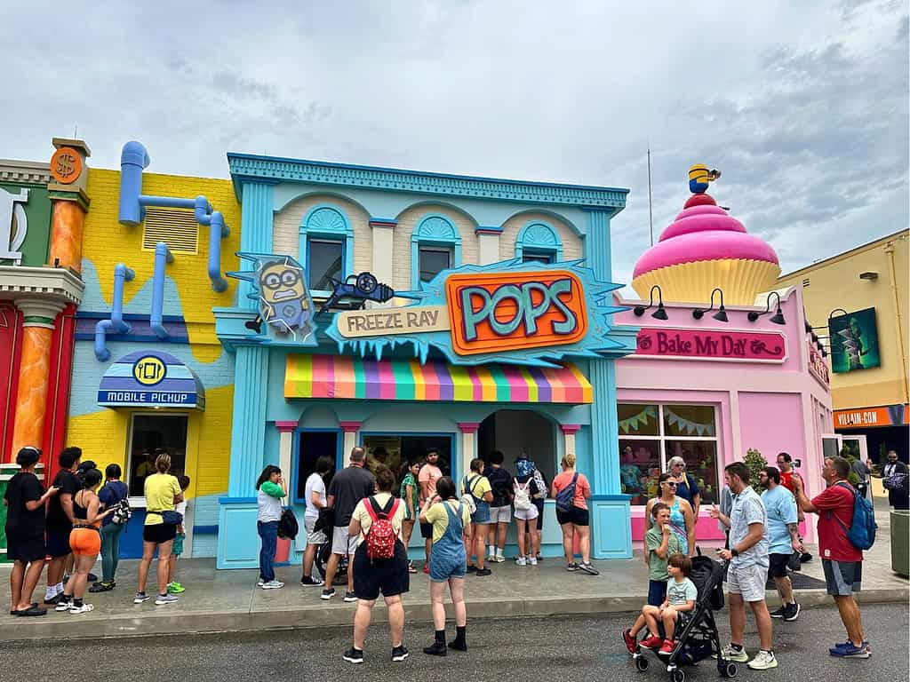 colorful storefronts at minion land universal orlando include freeze ray pops and bake my day featuring minions characters