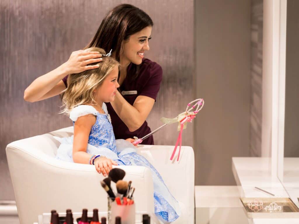 a four seasons staff member provides a Disney Princess Magical Makeover - image by Four Seasons Orlando Resort