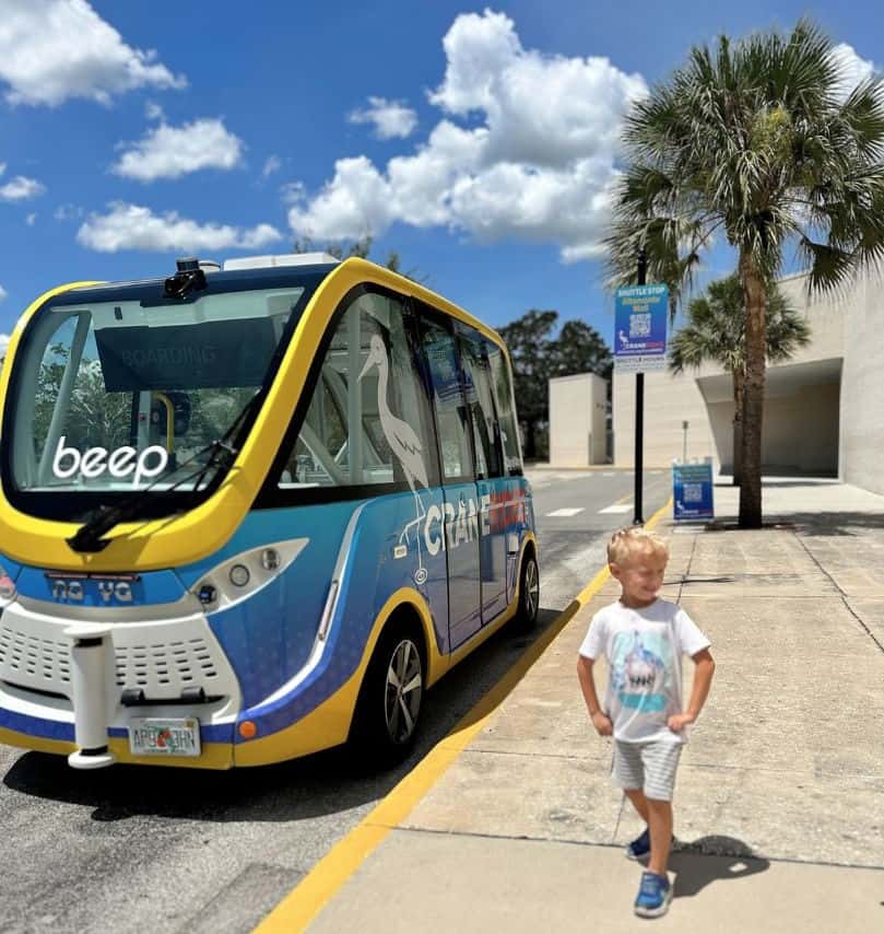 Young Boy Posing at Beep Autonomous Shuttle Altamonte Mall Stop