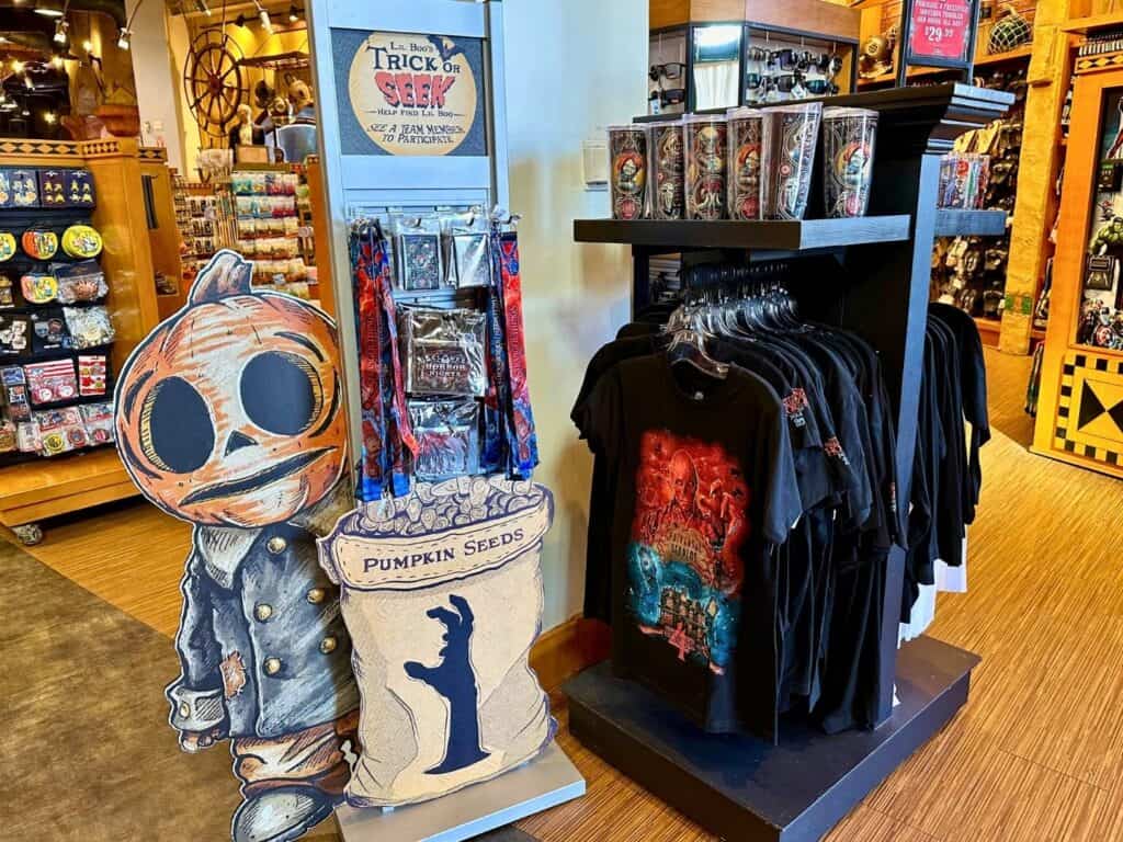 Lil Boo Scavenger Hunt Location Inside Merchandise Store at Universal Orlando near Stranger Things Halloween Horror Nights t-shirts on display