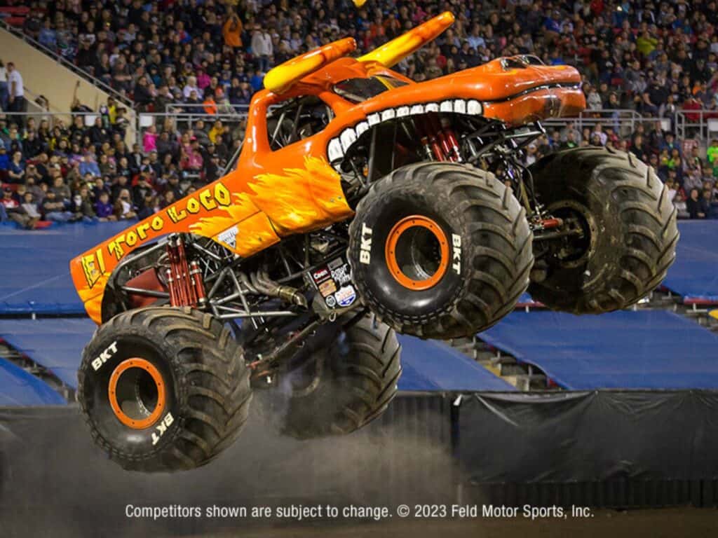 el toro loco monster truck drives up a ramp in a stadium 