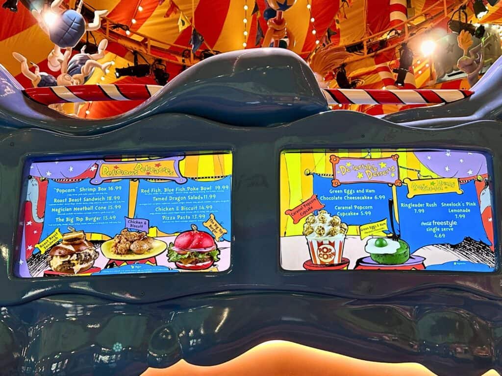 Image of two Circus McGurkus Restaurant Menu Display screens inside restaurant