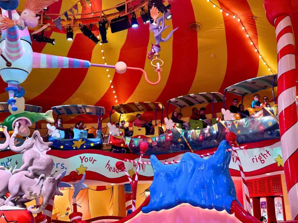 Image of the inside of the Circus McGurkus Restaurant Tent with ride vehicle going through