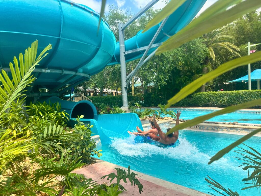 Guests Splashing Down at End of Tassie's Underwater Twirl New Water Slide at Aquatica Orlando 