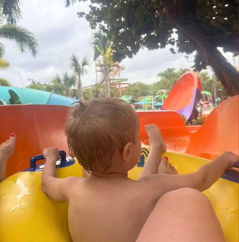 POV Mom Riding with Son on Tamariki Twirl Water Slide at Turi's Kid Cove Aquatica Orlando 