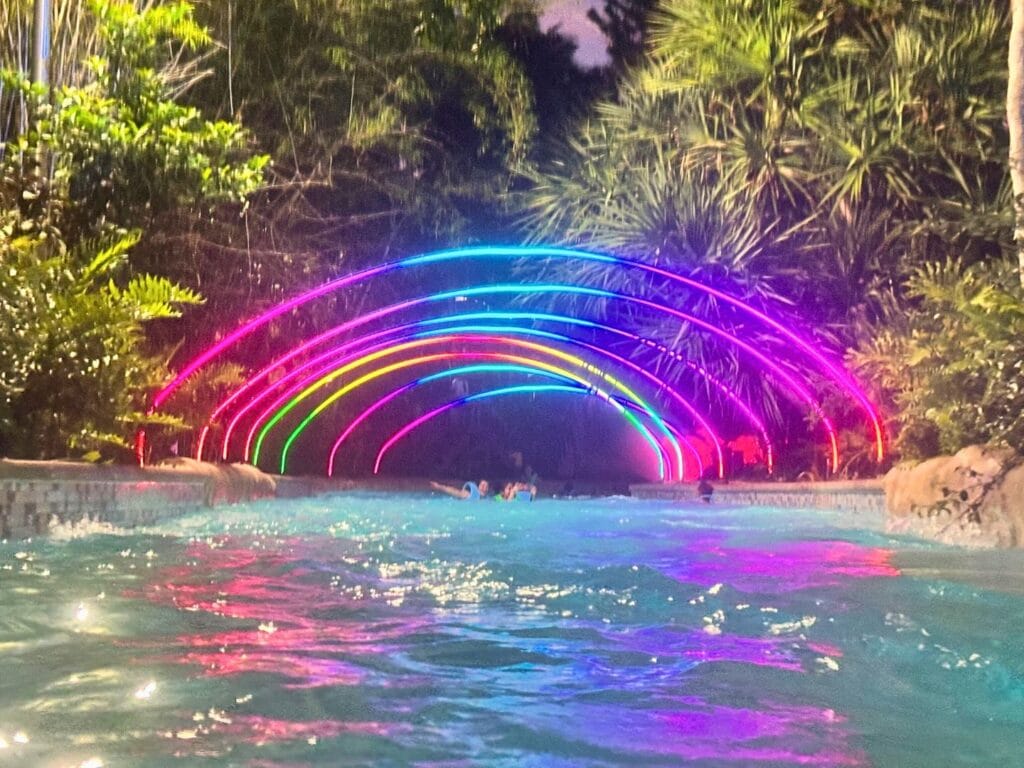 Roa's Rapids Amped Up lighted archways for AquaGlow at Aquatica Orlando - image by Dani Meyering