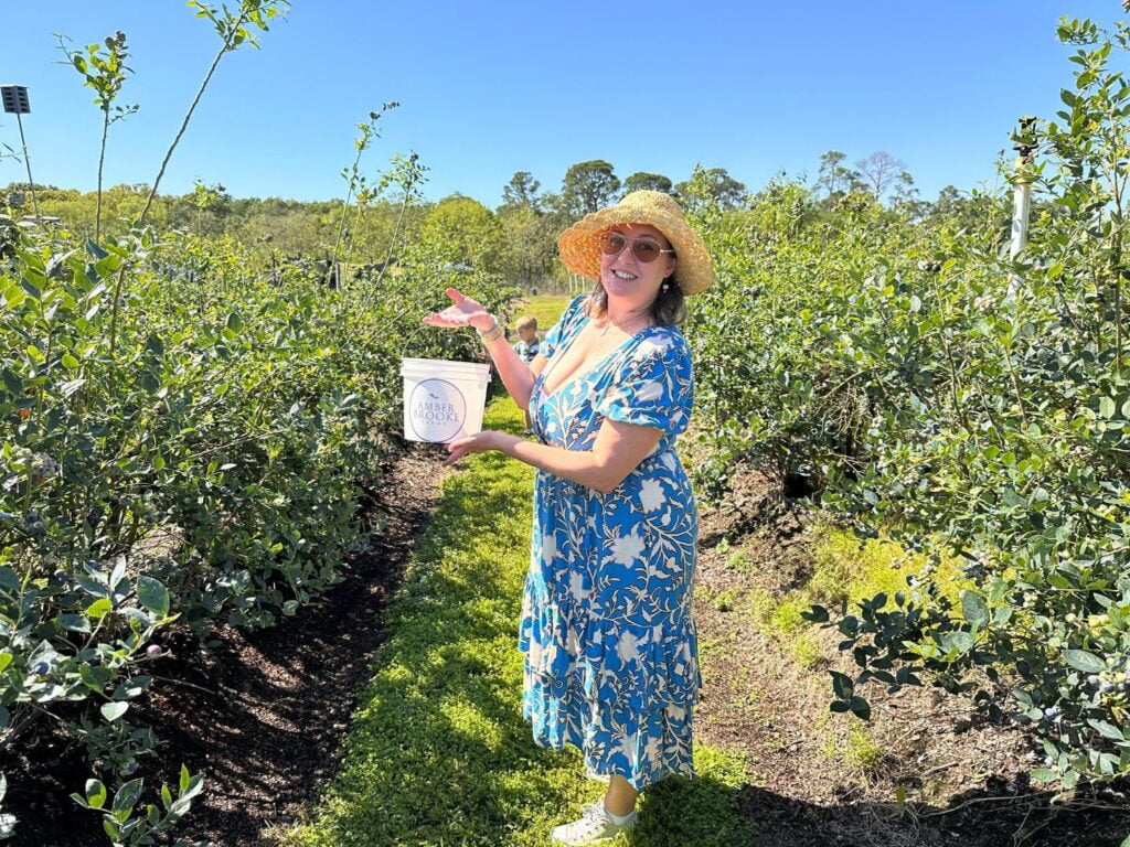 Mother and Son picking Blueberries Amber Brooke Farms in Eustis - image by Dani Meyering