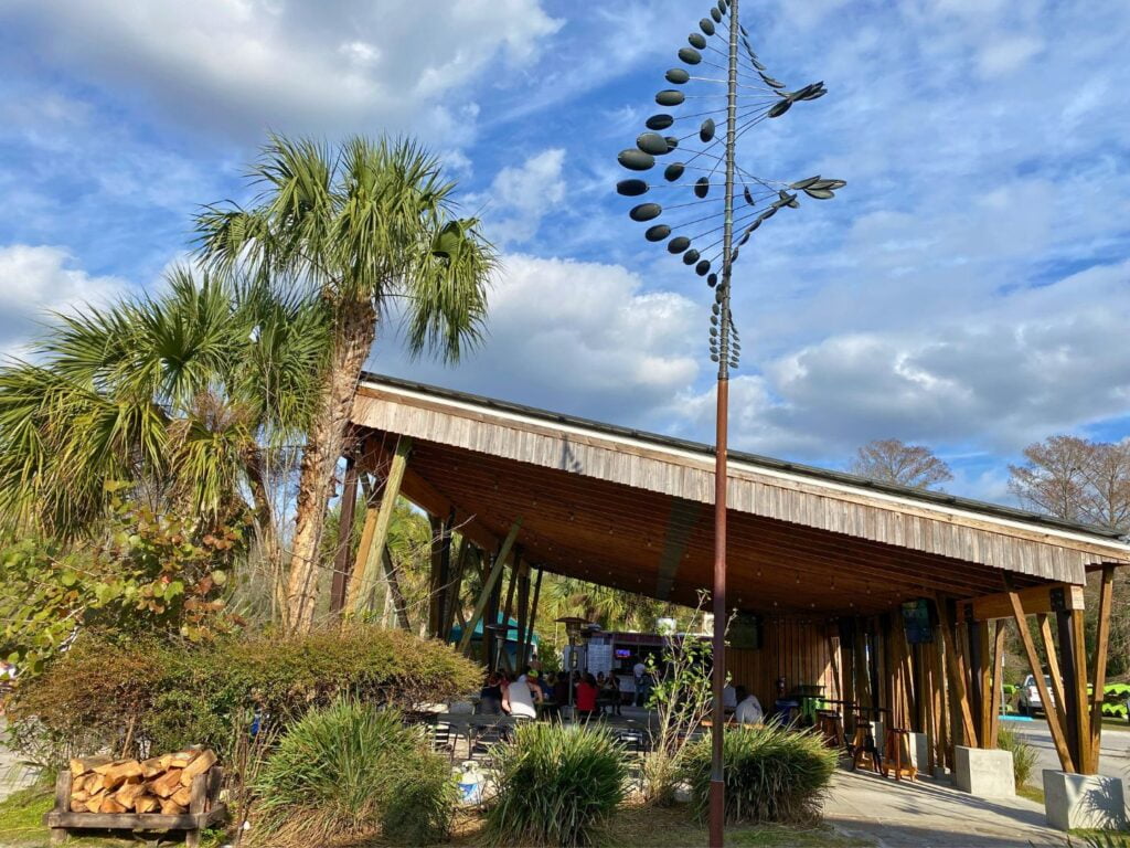 outdoor dining pavilion and art sculpture at wekiva island