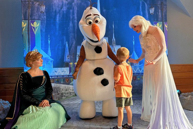 Young Boy meets Anna Elsa and Olaf Frozen Characters at EPCOT
