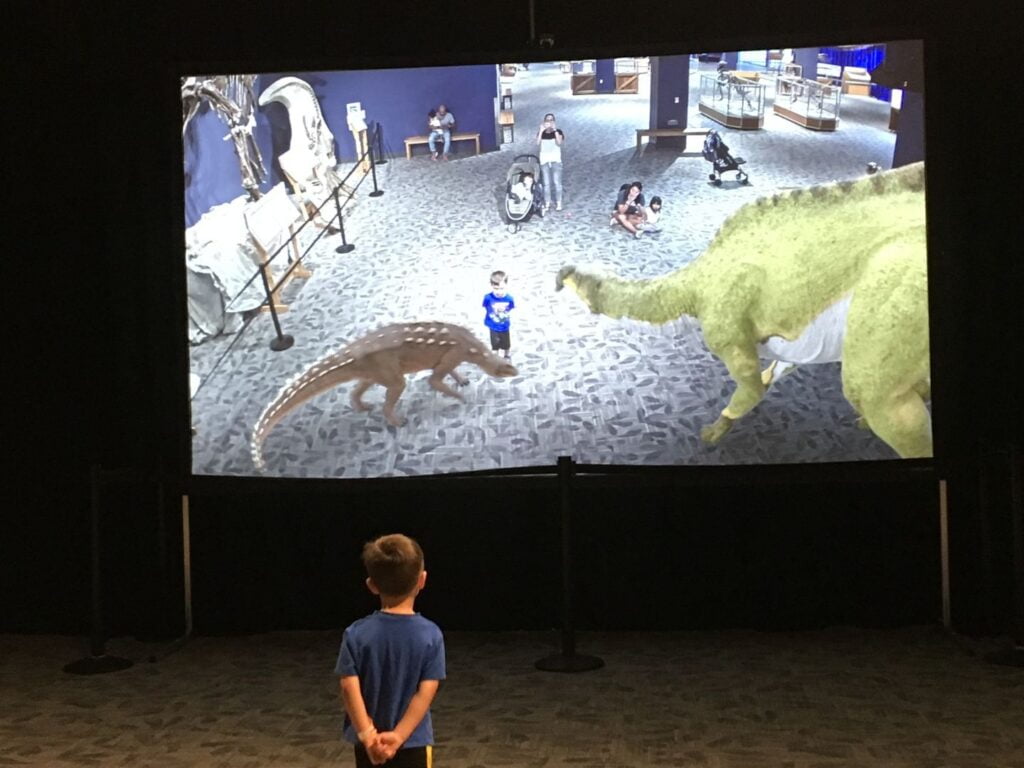 Interactive screen at Dino Digs within Orlando Science Center is among the dinosaur places in Orlando
