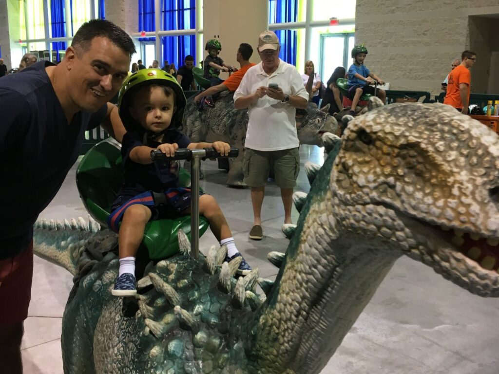 Ride-on dinosaurs at Jurassic Quest 
