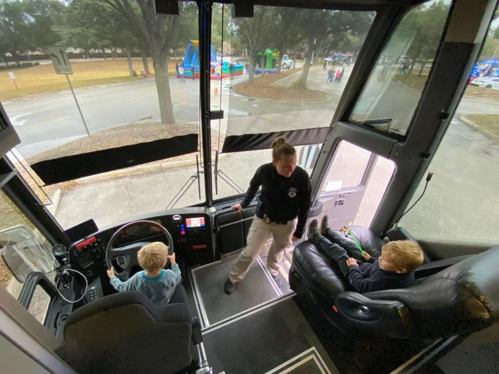 Young boys inside ATF Bus at Cops N Cars Event Oviedo