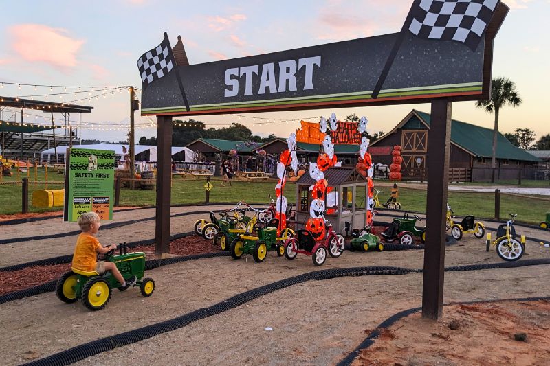 tractor race for kids Cowboy Adventure Park near Orlando with Halloween decorations