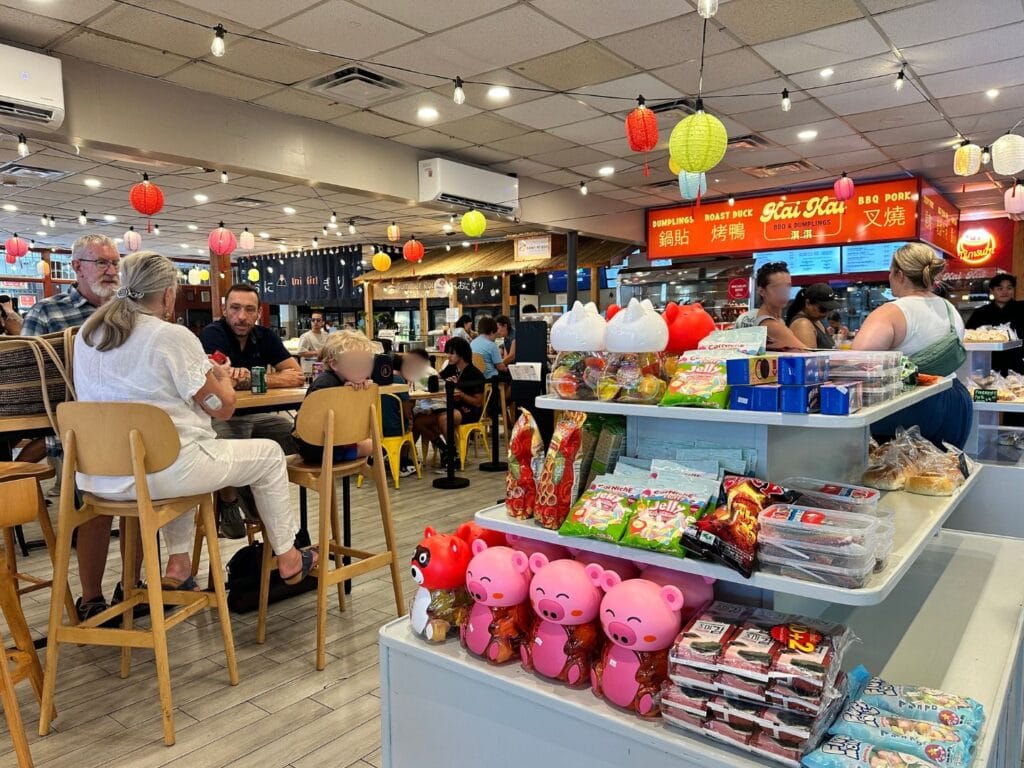Grandparents and father with son dine together Mills Market in Orlando - image by Dani Meyering