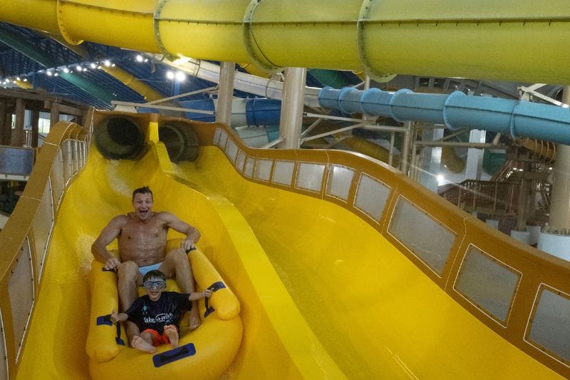 All Pro NFL tight-end & FOX NFL Sunday contributor, Rob Gronkowski, rides water slides with a Make-A-Wish child at Great Wolf Lodge