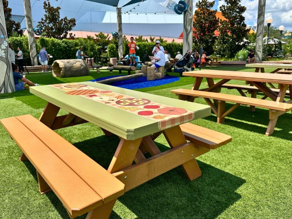 EPCOT Food and Wine Festival 2025 Harvest Hollow Play Area themed picnic table - image by Dani Meyering