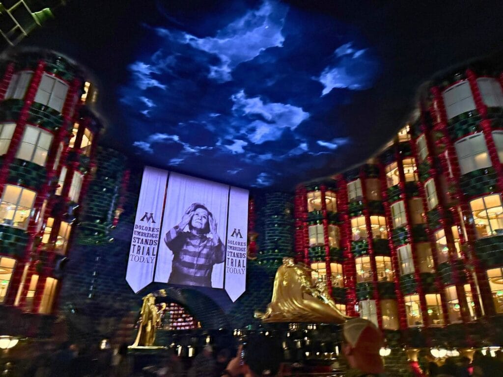 The Harry Potter and the Battle at the Ministry™ queue with Professor Umbridge banner - image by Jodi Caballero
