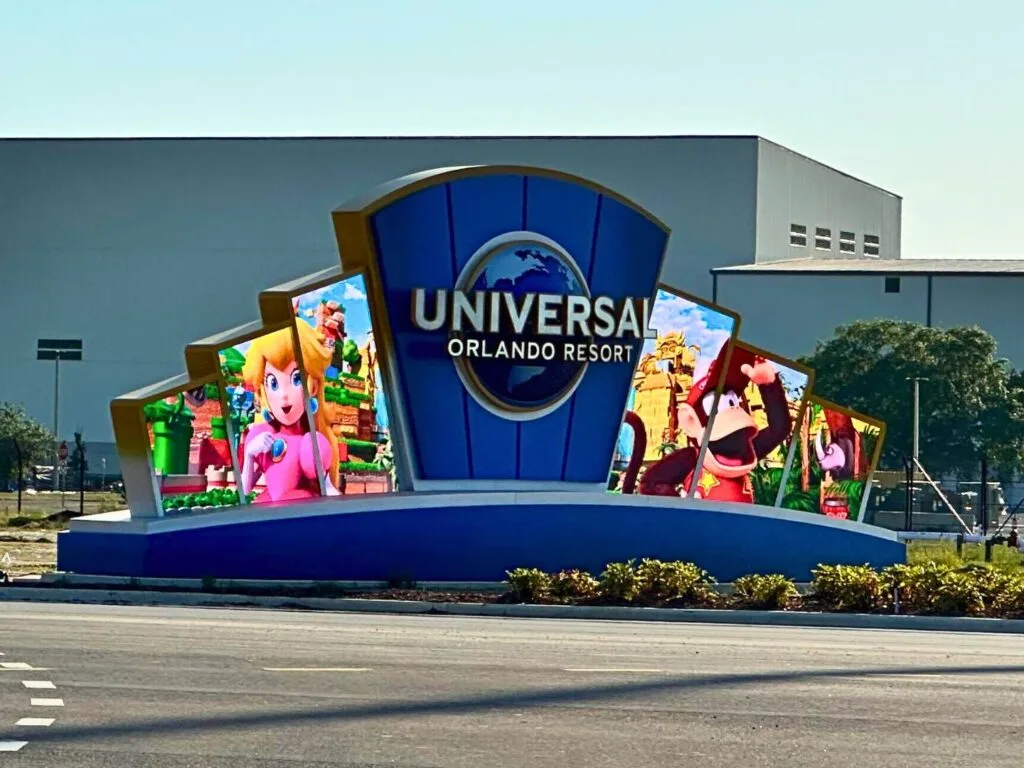 Epic Universe Illuminated Sign with Super Mario and Donkey Kong Characters on Universal Blvd - image by Dani Meyering