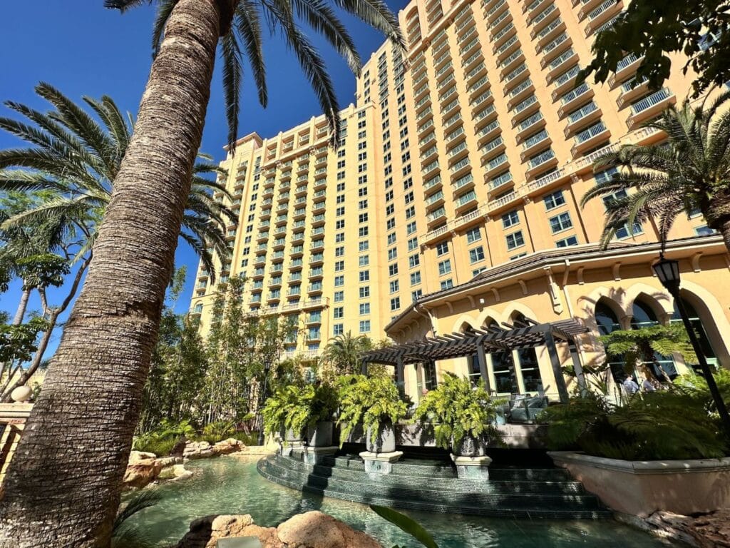 JW Marriott Grande Lakes water features and towering hotel near Epic Universe - image by Dani Meyering