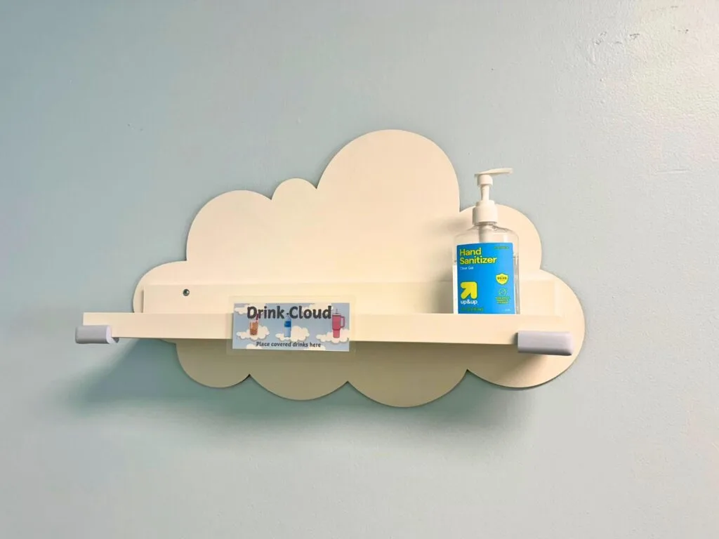 Shelf for drinks and hand sanitizer at The Play Fort Deltona - image by Dani Meyering