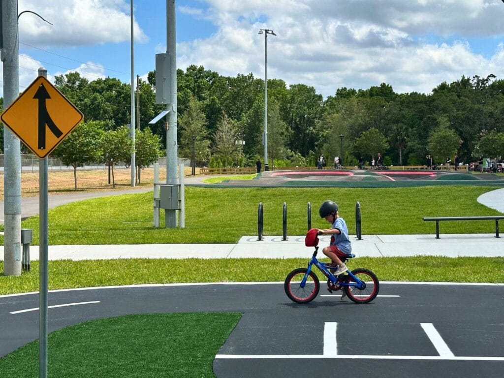 Wheel Park East in Casselberry young kids flat bike path young boy riding his bike - image by Dani Meyering