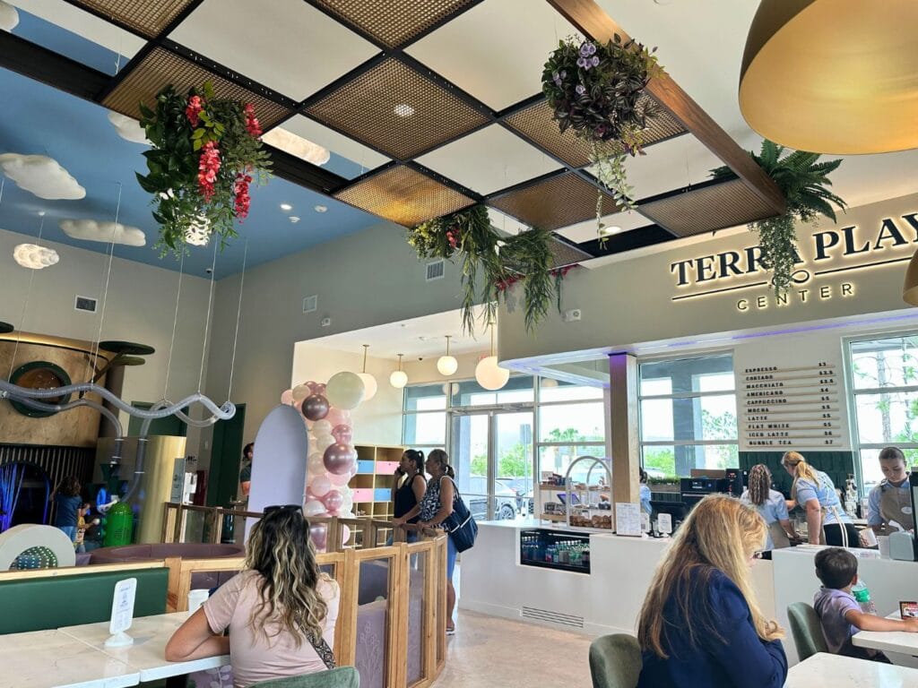 parents enjoying Terra Play Center Lake Nona Cafe Area - image by Dani Meyering