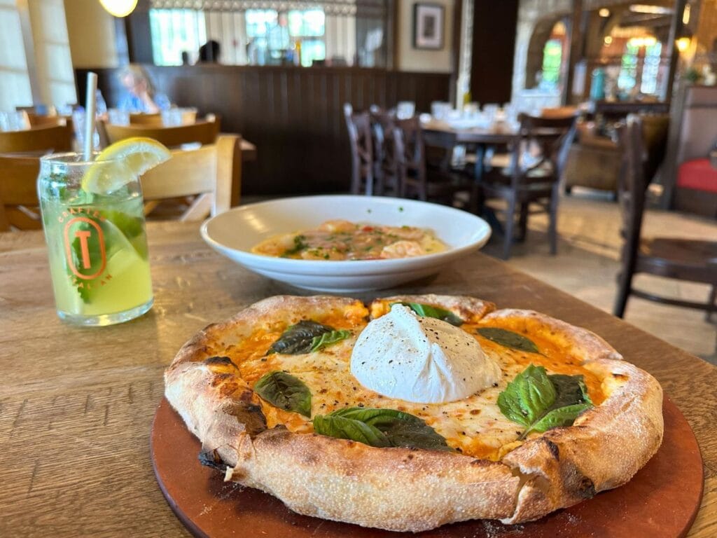 Burrata Pizza and Shrimp and Grits from Terralina Crafted Italian Disney Springs Flavors of Florida - image by Dani Meyering