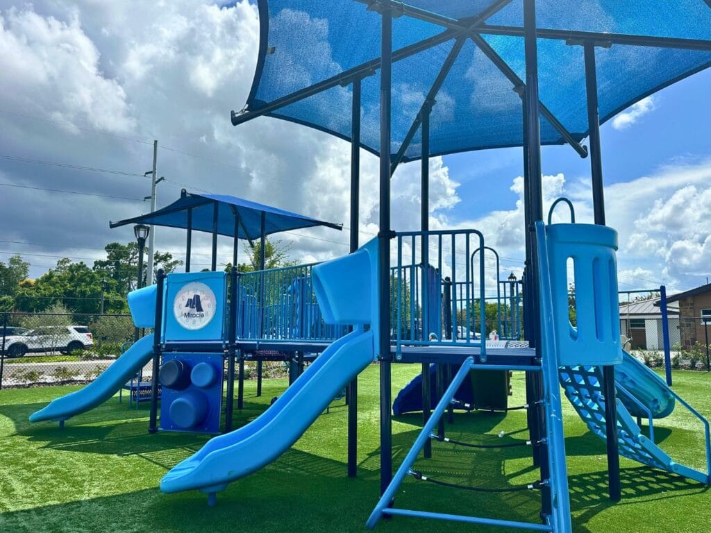 Wirz Park Playground Casselberry with shade facing parking lot - image by Dani Meyering