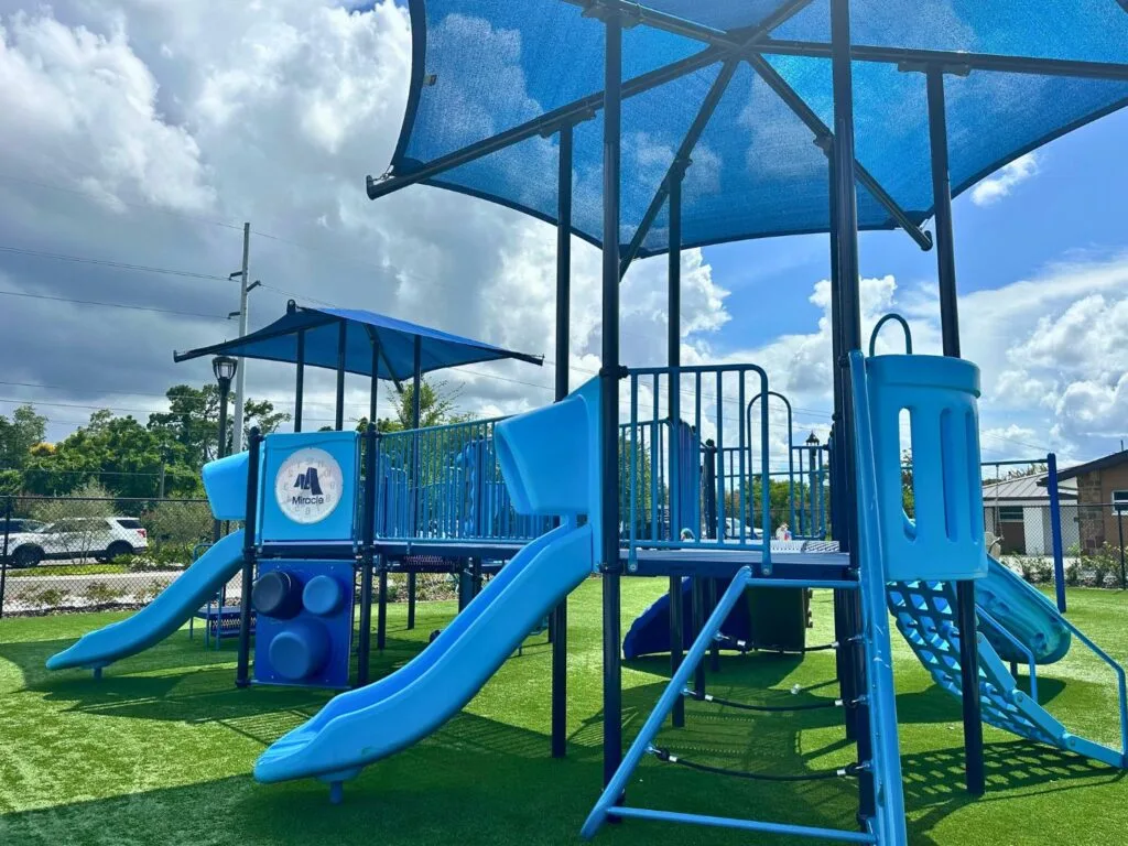 Wirz Park Playground Casselberry with shade facing parking lot - image by Dani Meyering