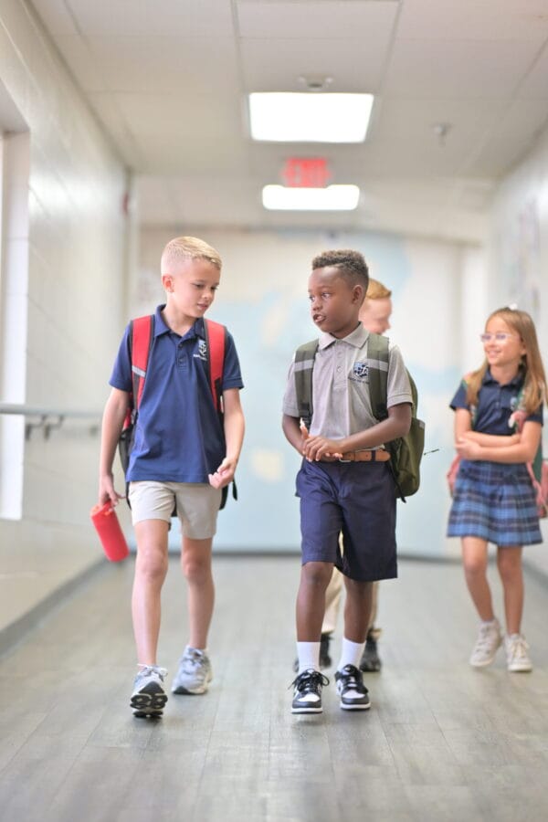 Foundation Academy Students walking in hallway