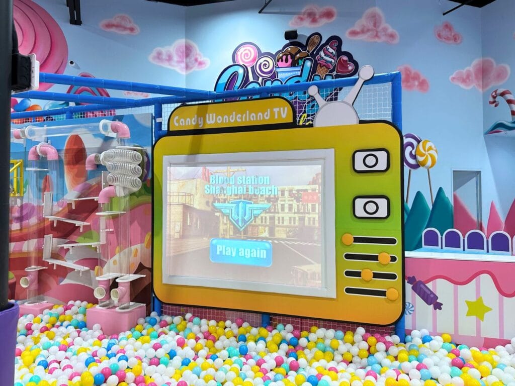 Candy Wonderland in Palm Bay Toddler Area on screen game with war theme - image by Dani Meyering