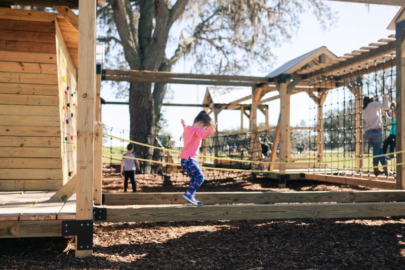 The playground at Amber Brooke Farms has tons of balancing features for kids