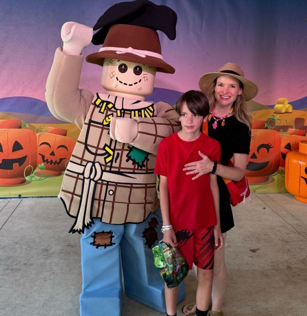 Duplo Valley Scarecrow Character at Legoland Florida with a mom and her son - image from Laura Byrne