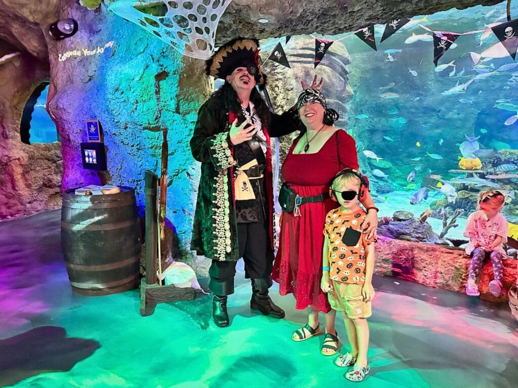Young boy and mom meet Captain Sebastian at SEA LIFE Orlando Pirates of the Haunted Seas - image by Dani Meyering