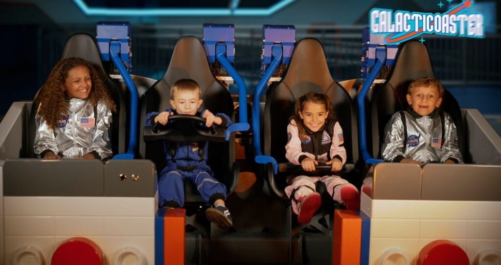Galacticoaster ride vehicle kids on board at IAAPA - image from LEGOLAND Florida