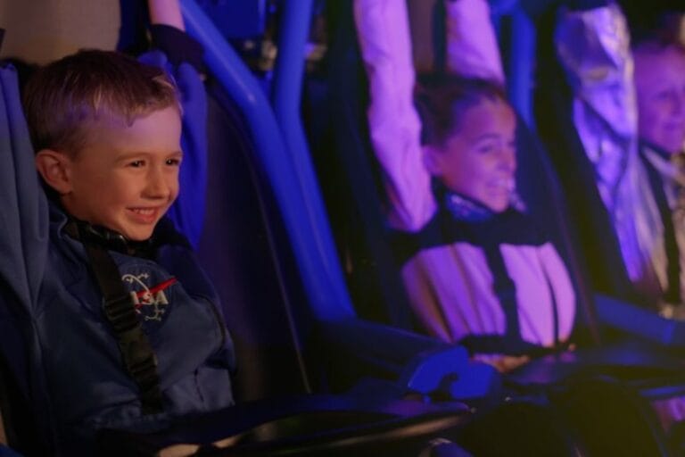 Galacticoaster ride vehicle smiling kid - image from LEGOLAND Florida