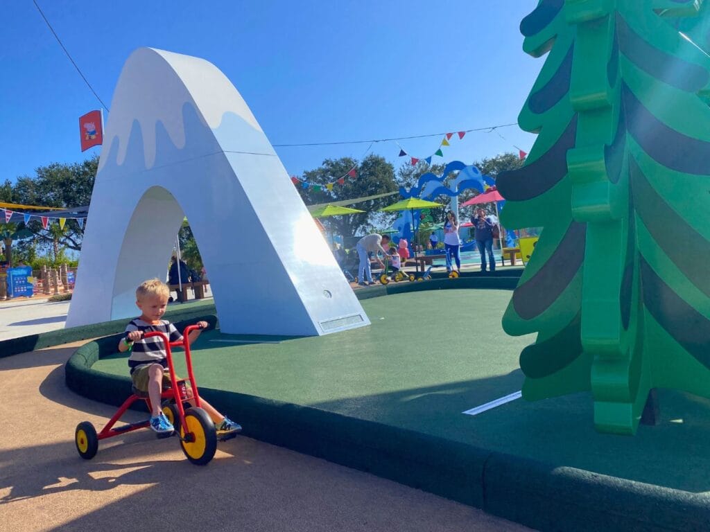 young boy at Peppa Pig Theme Park Peppa’s Pedal Bike Tour and George’s Tricycle Trail - image by Dani Meyering