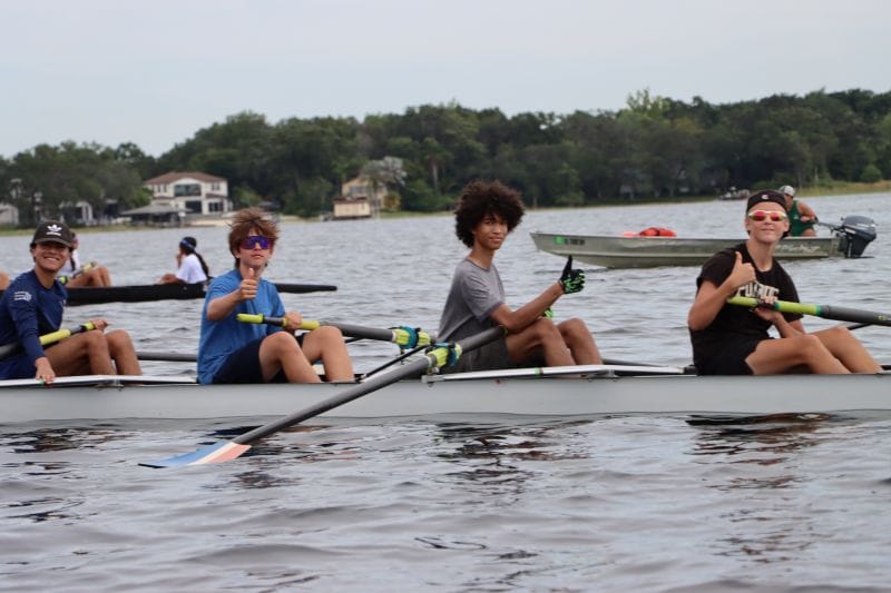 OARS campers rowing