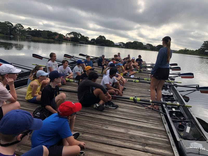 Orlando Area Rowing Society OARS campers learning from instructor on dock