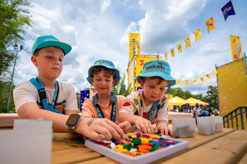 LEGOLAND Florida Theme Park kids at brick station - image from LEGOLAND