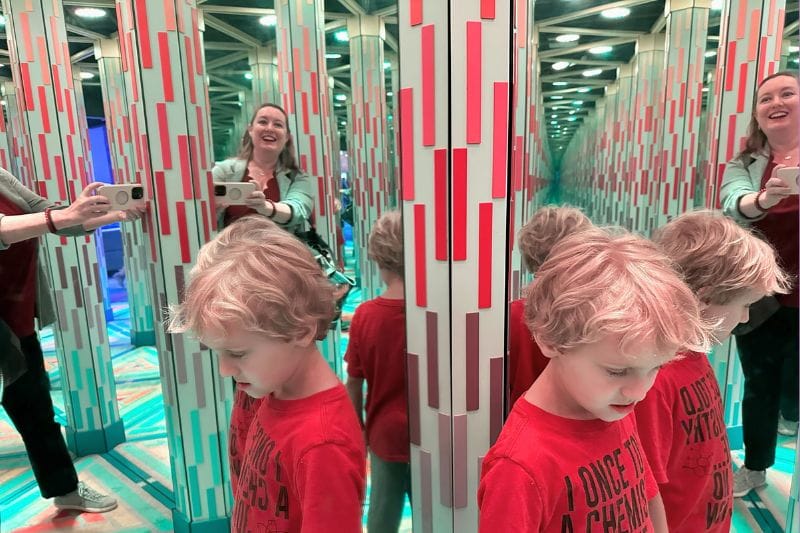 Mother and son in Hall of Mirrors Mystery Fun House Arcade Orlando