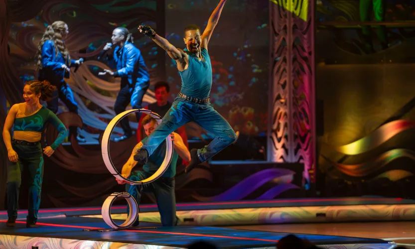 Experience a thrilling acrobatic show at Electric Ocean
