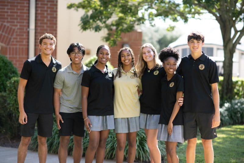 students posing at Bishop Moore Catholic High School