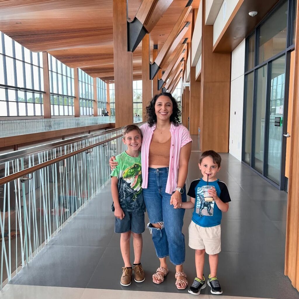 Mom and her 2 sons pose at the Center for Health & Wellbeing in Orlando