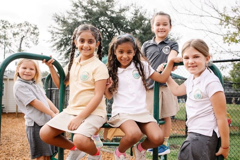 Lake Forrest Preparatory School students smiling on playground