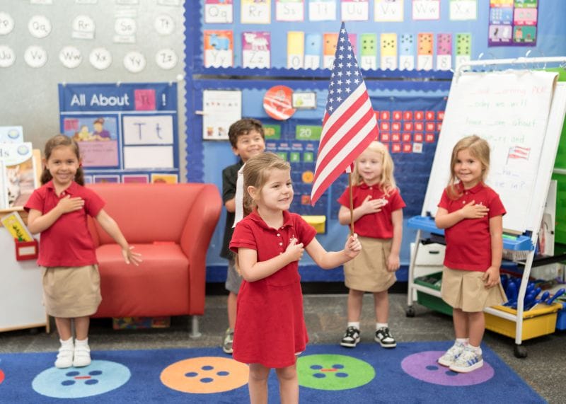 students at Lake Highland Prep in Orlando with the U.S. fkag