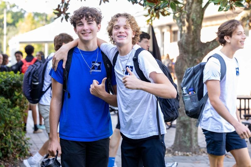 two male students giving thumbs up at The Master’s Academy