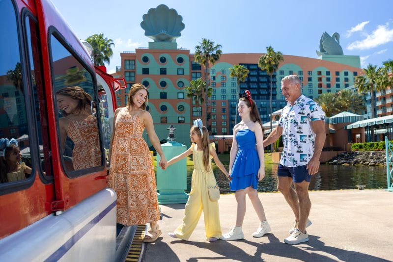 Family boarding the shuttle to Disney World at Walt Disney World Swan and Dolphin Resort