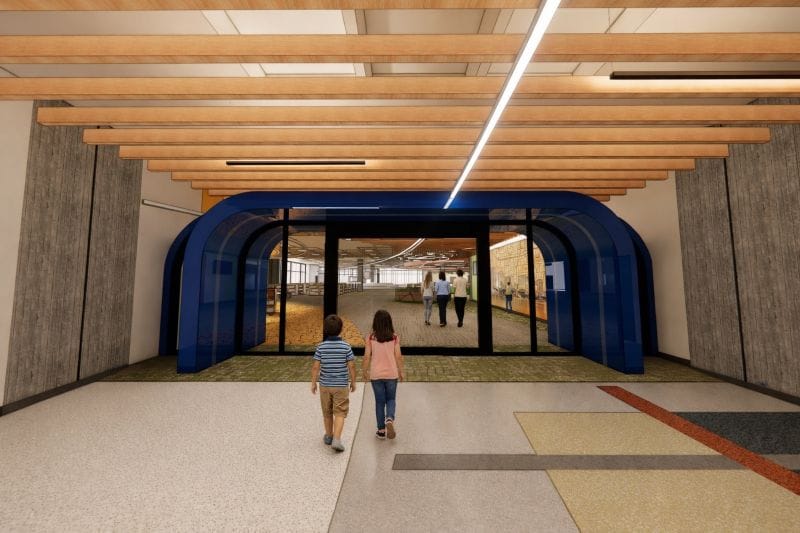 Two children walking into Orlando public library 